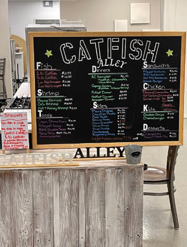 Catfish Alley restaurant menu board and counter for family meet and greet venue